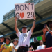 A Detroit Tigers fan holding a sign that says "Don't Go" with a broken heart symbol and the number 29.
