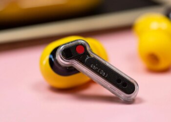 The Nothing Ear 3A earbuds on a mauve background with their case.
