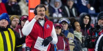 Head coach Mike Vrabel of the New England Patriots on the sideline during a game.