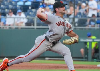 San Francisco Giants starting pitcher Trevor McDonald (72) delivers a pitch against the Kansas City Royals during the first inning at Kauffman Stadium