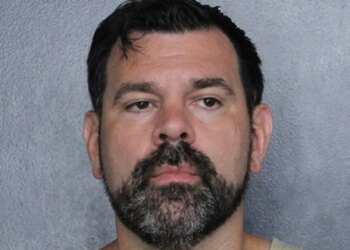 Mugshot of an equipment manager who was arrested.