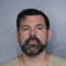Mugshot of an equipment manager who was arrested.