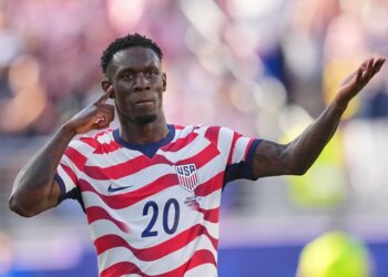 Folarin Balogun celebrating after scoring a goal for the United States.