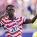 Folarin Balogun celebrating after scoring a goal for the United States.