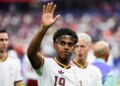 Lamine Yamal waves to the crowd at the FIFA World Cup semifinal match between France and Spain.