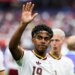 Lamine Yamal waves to the crowd at the FIFA World Cup semifinal match between France and Spain.