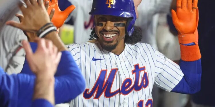 Francisco Lindor is all smiles as he celebrates with teammates after hitting a three-run home in the eighth inning of the Mets' blowout win over the Braves on July 27, 2026 at Citi Field.