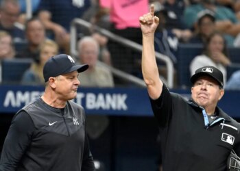Aaron Boone (left) gets ejected by home plate umpire Doug Eddings during the sixth inning of the Yankees-Rays game on July 8, 2026 at Tropicana Field in St. Petersburg, Fla.
