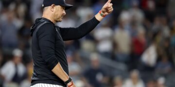 New York Yankees manager Aaron Boone signals for a pitching change in the ninth inning during the second baseball game of a doubleheader against the Pittsburgh Pirates, Wednesday, July 22, 2026, in New York.
