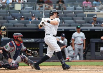 New York Yankees first baseman Ben Rice hitting a single during the 9th inning.