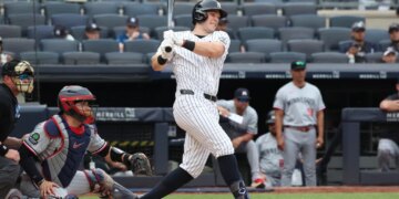 New York Yankees first baseman Ben Rice hitting a single during the 9th inning.