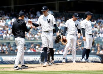 New York Yankees pitcher Cam Schlittler reacts after being taken out of the ball game by manager Aaron Boone in the fifth inning.