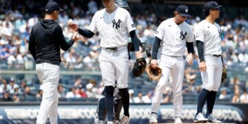 New York Yankees pitcher Cam Schlittler reacts after being taken out of the ball game by manager Aaron Boone in the fifth inning.