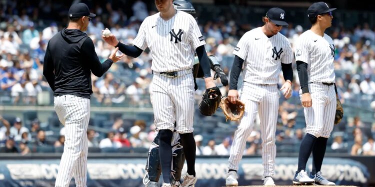 New York Yankees pitcher Cam Schlittler reacts after being taken out of the ball game by manager Aaron Boone in the fifth inning.