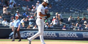 New York Yankees pitcher Camilo Doval (75) reacts after Minnesota Twins designated hitter Josh Bell (56) hits a two-run home run.