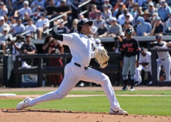 New York Yankees pitcher Carlos Lagrange #84, pitching in the 2nd inning.
