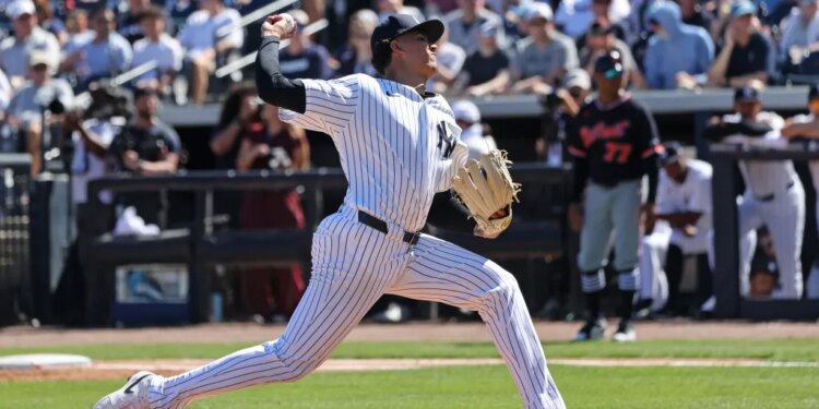 New York Yankees pitcher Carlos Lagrange #84, pitching in the 2nd inning.
