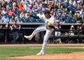 New York Yankees pitcher Carlos Lagrange #84 mid-pitch in the 1st inning.