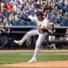 New York Yankees pitcher Carlos Lagrange #84 mid-pitch in the 1st inning.