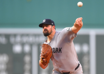 New York Yankees pitcher Carlos Rodón delivers a pitch.