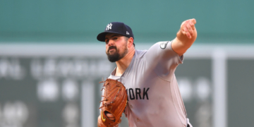 New York Yankees pitcher Carlos Rodón delivers a pitch.