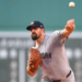 New York Yankees pitcher Carlos Rodón delivers a pitch.