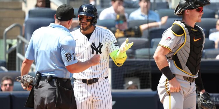 Yankees shortstop Jose Caballero argues with the home plate umpire after being called out on strikes during the sixth inning in Game 1 of a doubleheader against the Pirates on July 22, 2026.