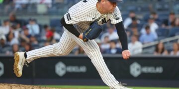 New York Yankees pitcher Ryan Weathers pitches during the third inning against the Pittsburgh Pirates.