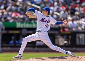 New York Mets pitcher Zach Thornton throwing a pitch against the Kansas City Royals.